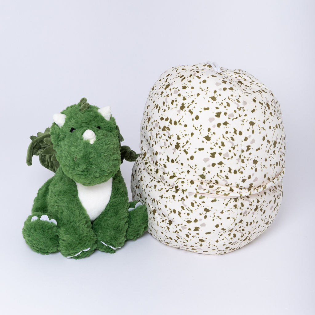 Dragon junto a su huevo moteado