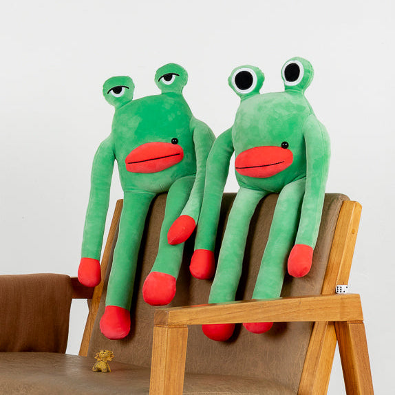 Ranas de peluche con labios rojos y lunar característico