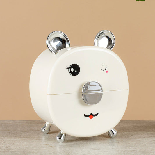 organizador con forma de oso que guiña el ojo