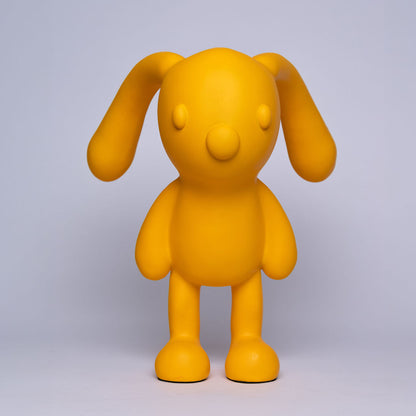 Figura decorativa de conejo amarillo 