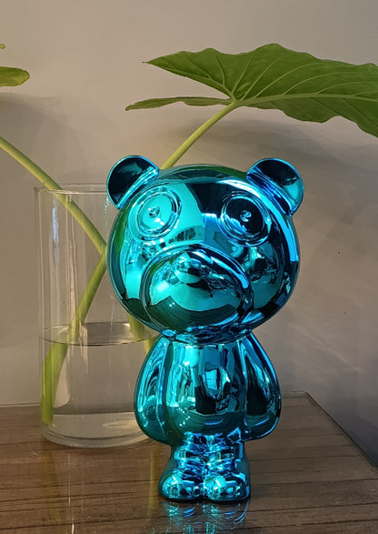 Oso decorativo moderno sobre mueble